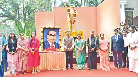 Governor RN Ravi and Union Minister L Murugan paying homage after unveiling Dr BR Ambedkar?s statue at Raj Bhavan on Tuesday.