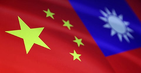 Chinese and Taiwanese flags are seen in this illustration