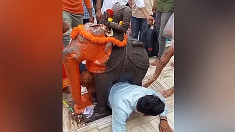 Viral: Man stuck under elephant statue in temple