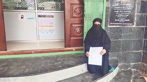 DMK?s ward 7 woman councillor Shakira Meeranji Saleem staging a sit in protest at Pernambut municipal office