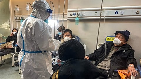 People receive medical attention in a Fever Clinic area in a Hospital in the Changning district in Shanghai.