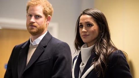Prince Harry and his wife Meghan