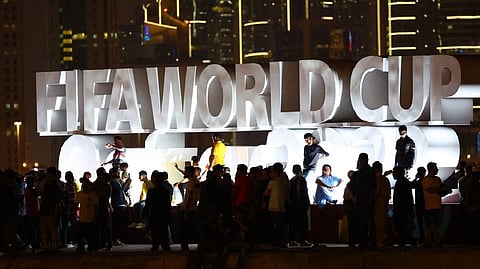 The FIFA World Cup logo is pictured on the Corniche Promenade ahead of the FIFA World Cup Qatar 2022