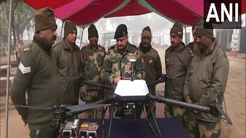 BSF troops with a Pak drone that was shot down.
