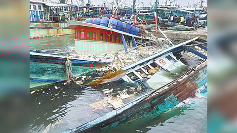 Damaged fishing boats in Kasimedu harbour