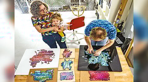 Rosenkrantz and Louis-Rosenberg are algorithmic artists who make laser-cut wooden jigsaw puzzles