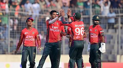 Nasum Ahmed celebrating with teamamtes