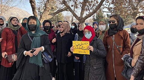 Afghan women participate in a protest against the university education ban for women, in Kabul, Afghanistan.