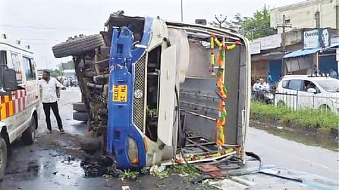 The vehicle overturned after hitting a median on the highway