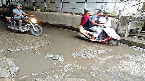 The potholed road witnessing water seepage in the subway connecting Stanley Medical College Hospital with other parts of city