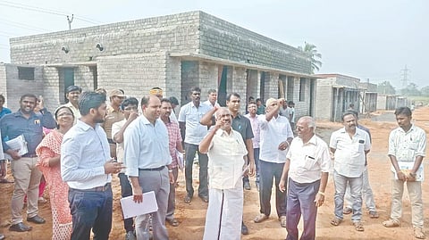Minorities Minister Gingee KS Masthan inspecting houses built for Sri Lankan refugees in Erode on Tuesday.