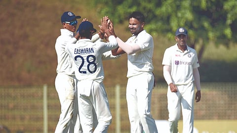 India A players celebrate the fall of a wicket