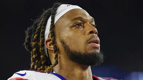 Buffalo Bills defensive back Damar Hamlin (3) leaves the field after an NFL football game against the New England Patriots.