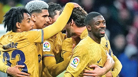 Barcelona?s Ousmane Dembele (right) celebrates with teammates after scoring against Atletico Madrid