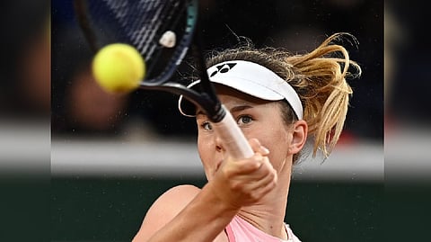Czech Republic's Linda Noskova in action during her first round match against Britain's Emma Raducanu