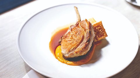 Slicked duck in orange sauce