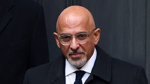 British Minister without Portfolio Nadhim Zahawi looks on outside the Conservative Party's headquarters in London, Britain
