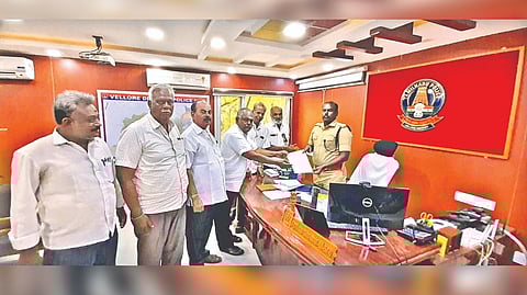 Vellore Lorry Owners Association members submitting a petition to SP S Rajesh Kannan on Monday.