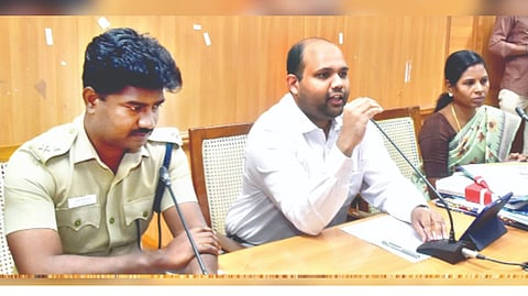 Erode Collector and election officer H Krishnanunni holding a meeting with representatives of political parties on Monday.
