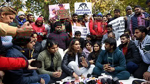 Wrestler Vinesh Phogat speaks to the media accusing the WFI prez Brij Bhushan Sharan Singh of sexual harassment during the protest, at Jantar Mantar, in New Delhi.
