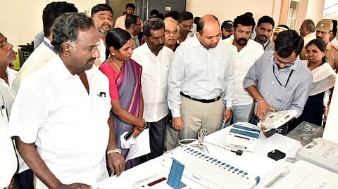 Erode District Collector H Krishnanunni inspected the first round verification of EVMs to be kept in polling booths on the day of voting.
