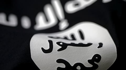 An Islamic State flag is seen in this picture illustration taken