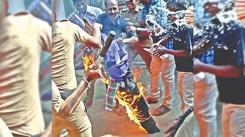 Members of Thanthai Periyar Dravidar Kazhagam (TPDK) staged a demonstration in Coimbatore against Governor RN Ravi on Tuesday.