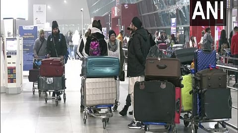 Passengers at Delhi's IGI airport on Wednesday