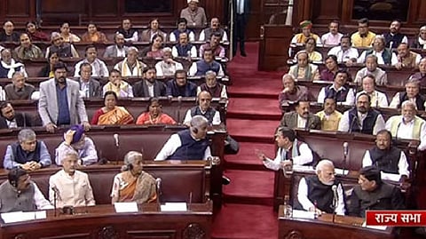 Modi and other MPs in Rajya Sabha on Friday.