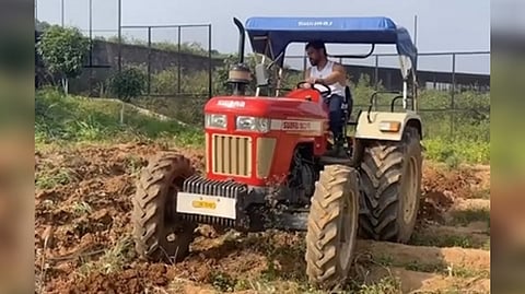 MS Dhoni drives tractor