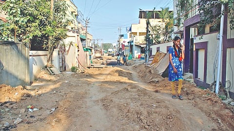 A dug up and poorly closed road in Manapakkam area