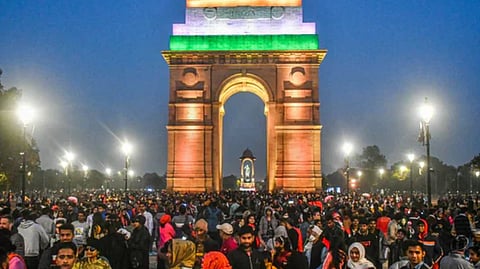 People throng India Gate for the NY celebrations, in New Delhi.