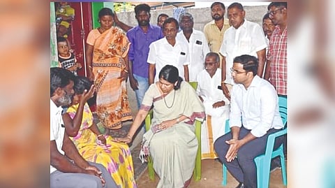 Thoothukudi MP Kanimozhi consoles the bereaved family of a student, who died last month in a fall, near Tiruchendur on Sunday