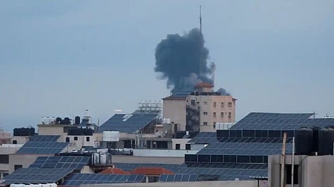 Smoke rises following an Israeli airstrike in the western Gaza Strip