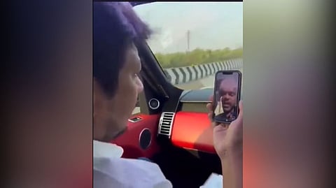 Udhayanidhi interacting with the student