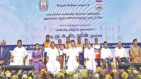 CM distributes certificates to corpn staff for flood, relief work