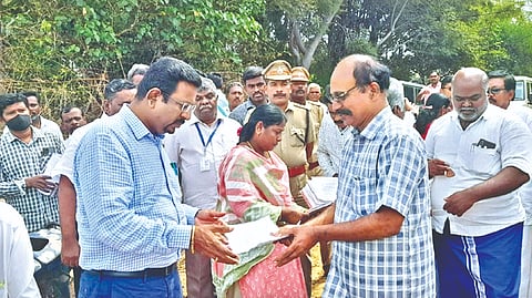 Social activists submit a petition to District Collector Dinesh
Ponraj Oliver (left) at the quarry on Saturday