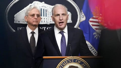 Justice Department's Assistant Attorney General for the National Security Division Matthew Olsenspeaks during a news conference at the Department of Justice in Washington, Jan. 27, 2023, as Attorney General Merrick Garlandlistens at left.