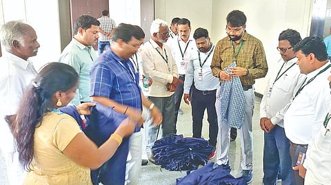Members of Maharashtrian
team visiting a sewing unit in SP Koil
on Tuesday