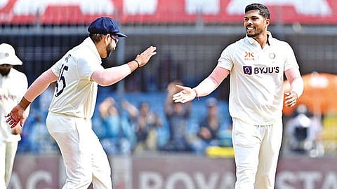 Umesh Yadav (right) bowled his heart out in the first session