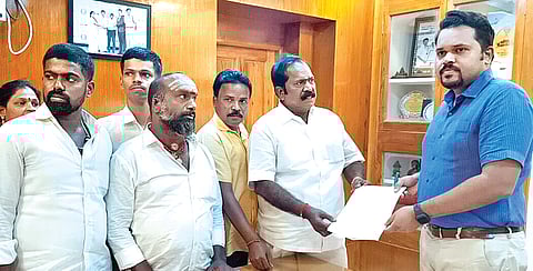 Residents with MP K Arumugam submit petition to District collector