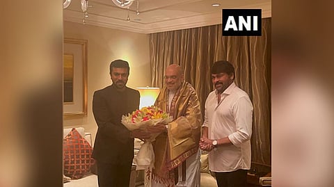 Home Minister Amit Shah with Ram Charan and Chiranjeevi