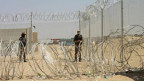 Pakistan Army soldiers stand guard at Pakistan-Afghanistan border crossing point in the town of Chaman, Pakistan