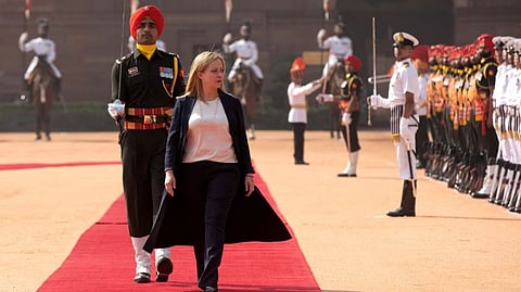 Italian Prime Minister Giorgia Meloni inspects a guard of honour during her ceremonial reception at the forecourt of India's Presidential Palace Rashtrapati Bhavan in New Delhi, India, March 2, 2023