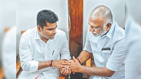 BJP TN chief K Annamalai consoling AIADMK leader O Panneerselvam on his mother?s demise on Tuesday