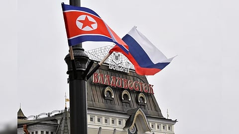 State flags of Russia and North Korea fly in a street near a railway station during the visit of North Korea's leader Kim Jong Un to Vladivostok, Russia April 25, 2019