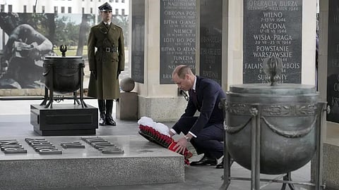 Britain's Prince William lays a wreath of flowers at the Tomb of the Unknown Soldier