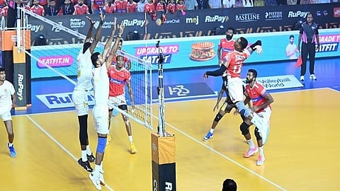 Calicut Heroes and Ahmedabad Defenders players in action