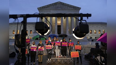 Student debt relief advocates gather outside Supreme Court on Capitol Hill
