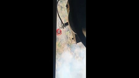 IAF's Mi-17 chopper dispensing water over fire-affected areas in Goa